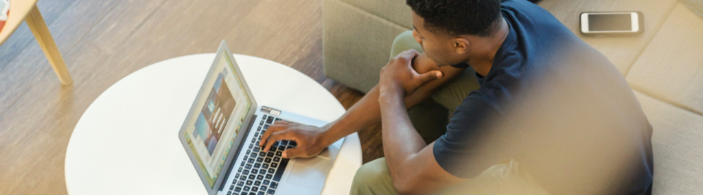 image of man on laptop accessing linkedin.com